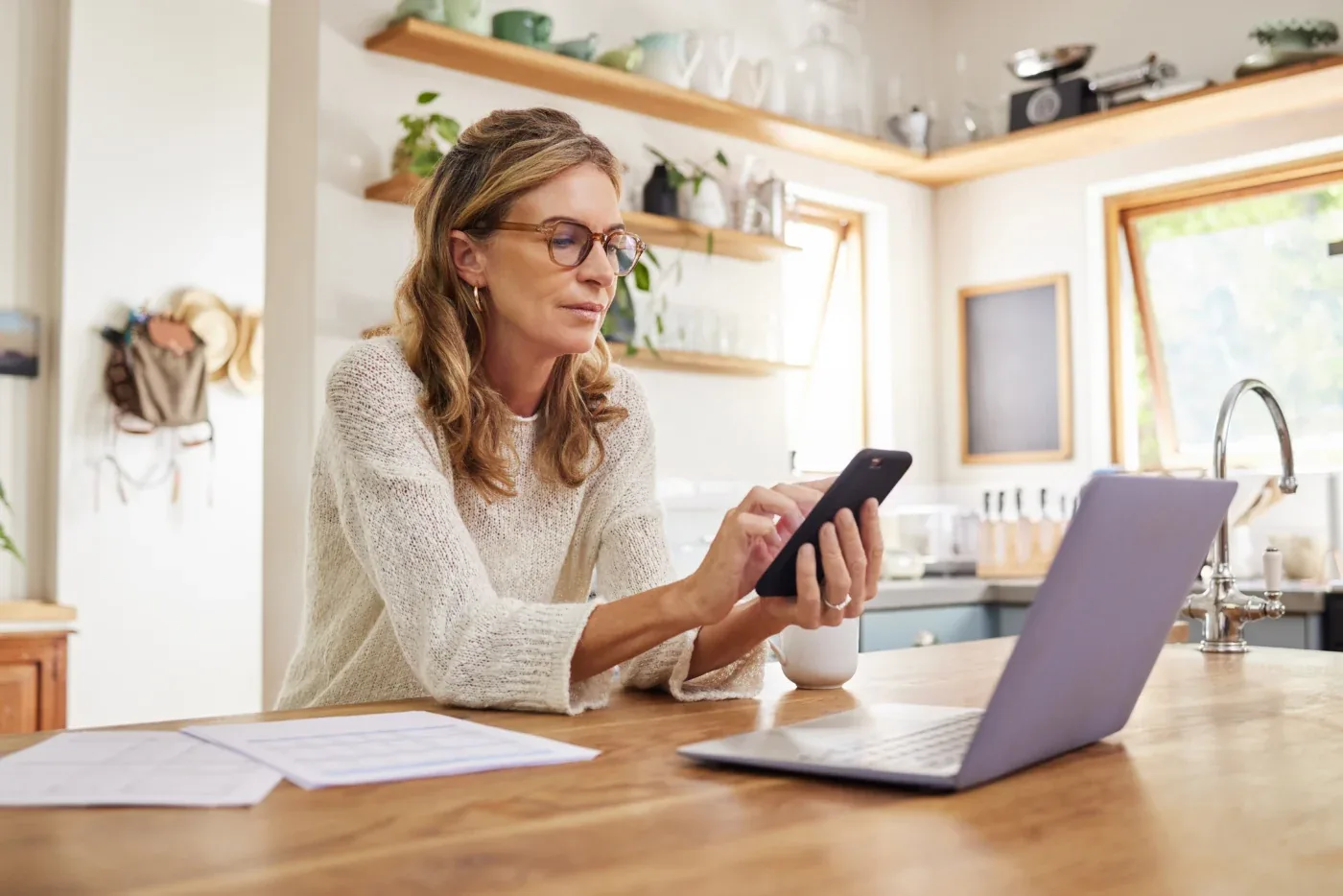A person shops for window treatment financing solutions online in Arizona and Las Vegas Valley region | Southwest Blinds and Shutters