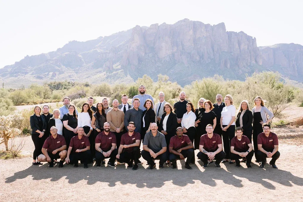 The Southwest Blinds team together in a photo frame