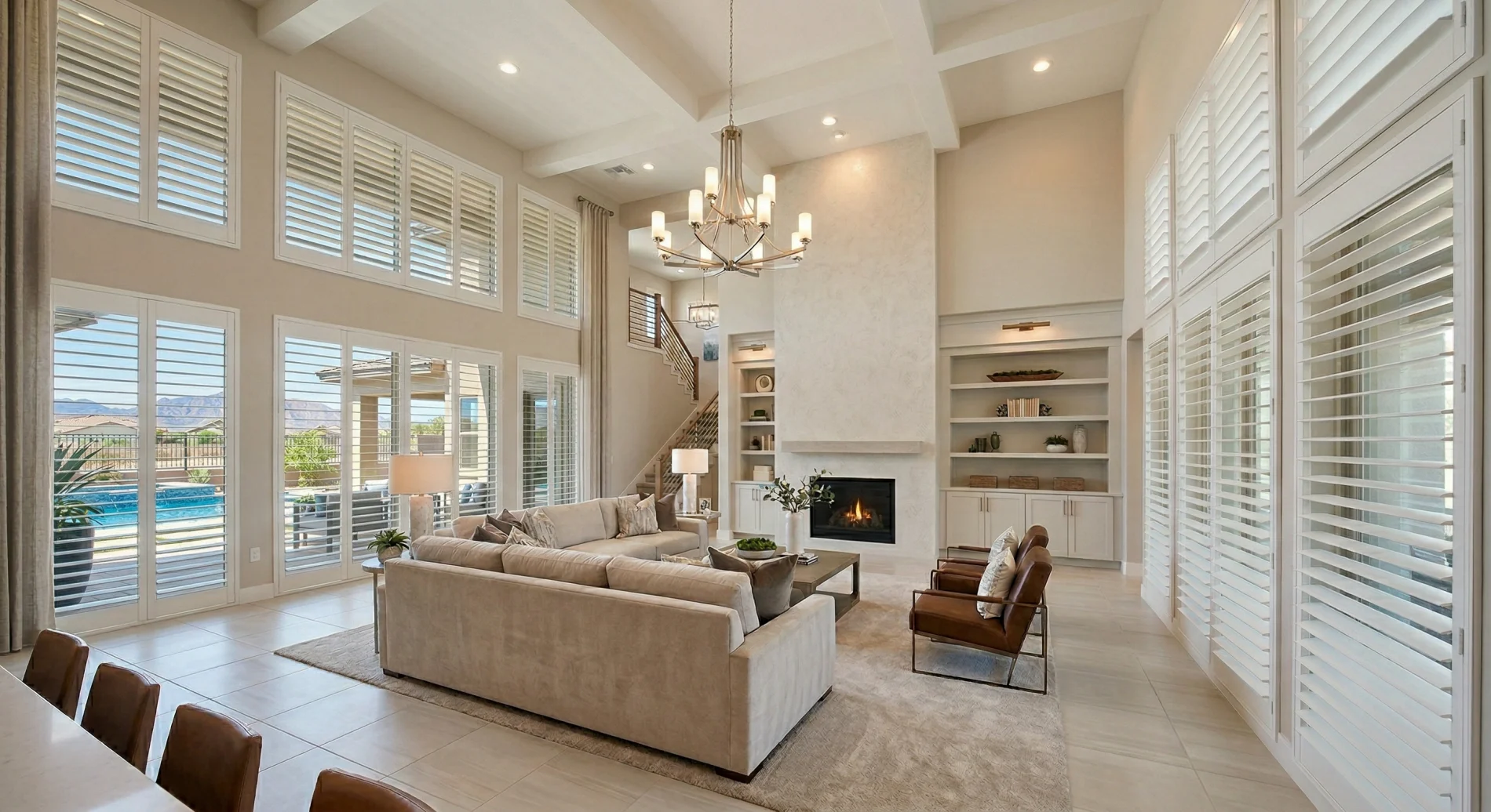 Plantation shutters fitted throughout a bright desert-modern living room