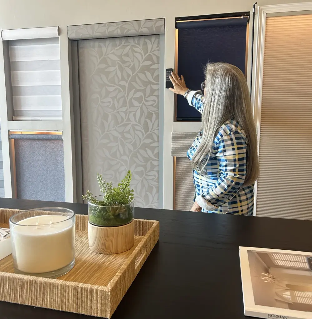 Penny from Southwest Blinds is demonstrating motorization