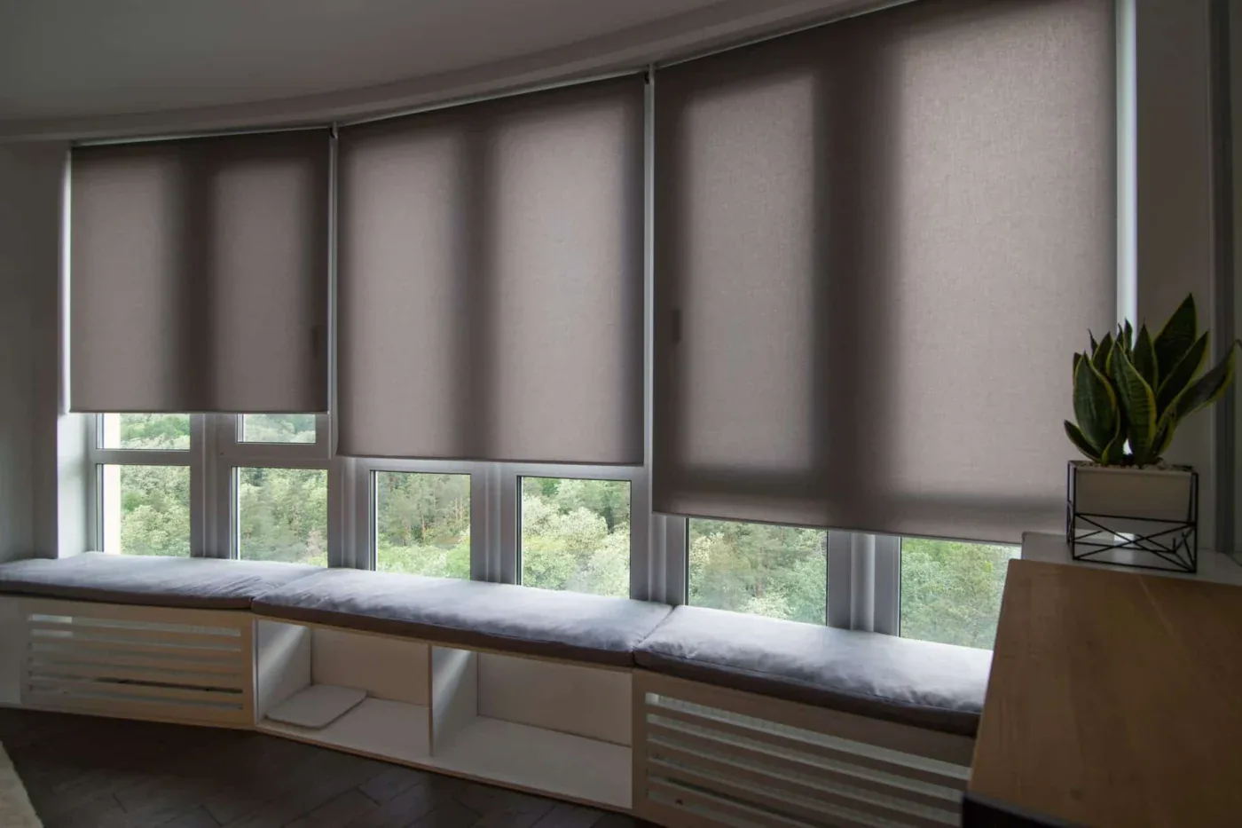 Motorized shades in an Avondale home at dusk