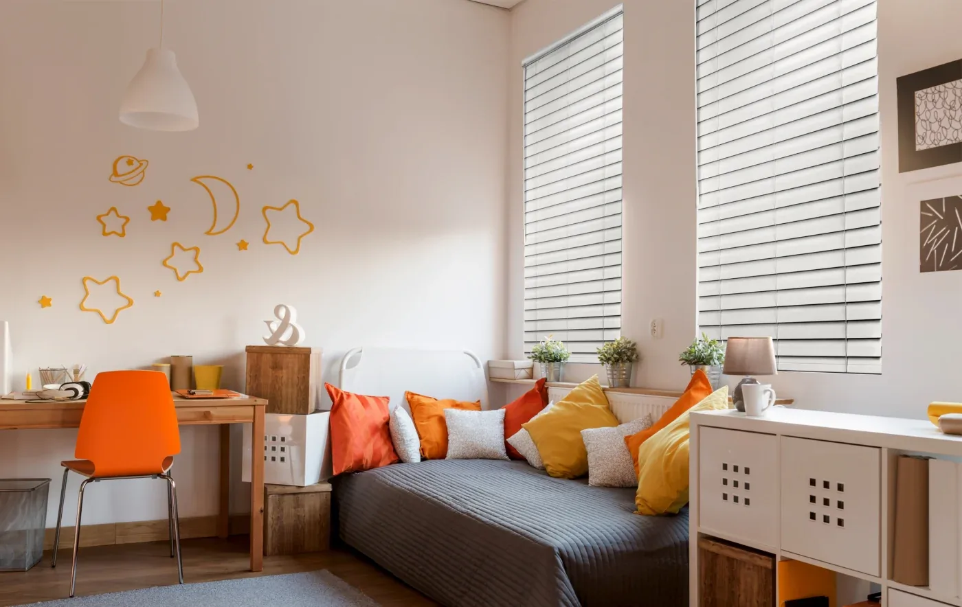 Moisture-resistant faux wood blinds in a bathroom window