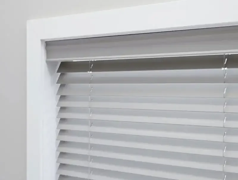 Lutron Serena roller shades shown in several wood finishes