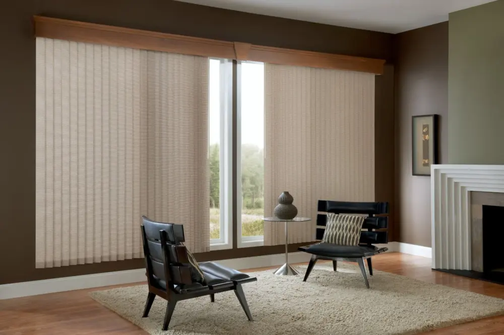 Beige vertical blinds are slightly open over an expansive patio door.