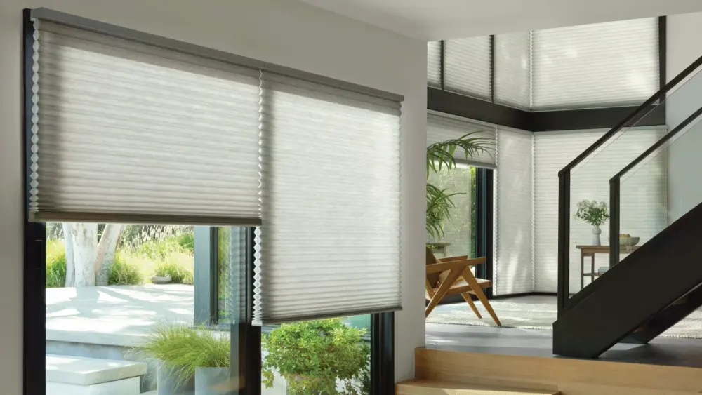 Entryway with white interior and white motorized shades and wooden steps