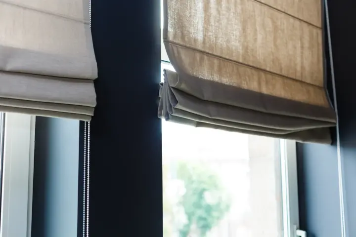 Close-up shades on windows in Whitney home installed by Southwest Blinds & Shutters