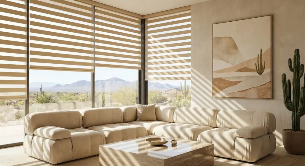 A bedroom with white walls and dark-stained wooden furniture. There are two large windows on the same wall, and they're both covered by dark gray interior shutters. The shutter slats are angled to let light in between them.