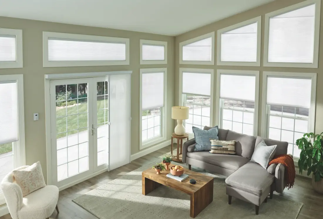 Overhead view of a sunroom with custom-designed window shades.