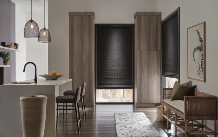 Black motorized shades in a modern kitchen