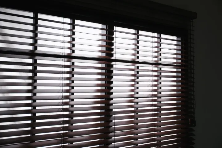 Rich faux blinds on a large window