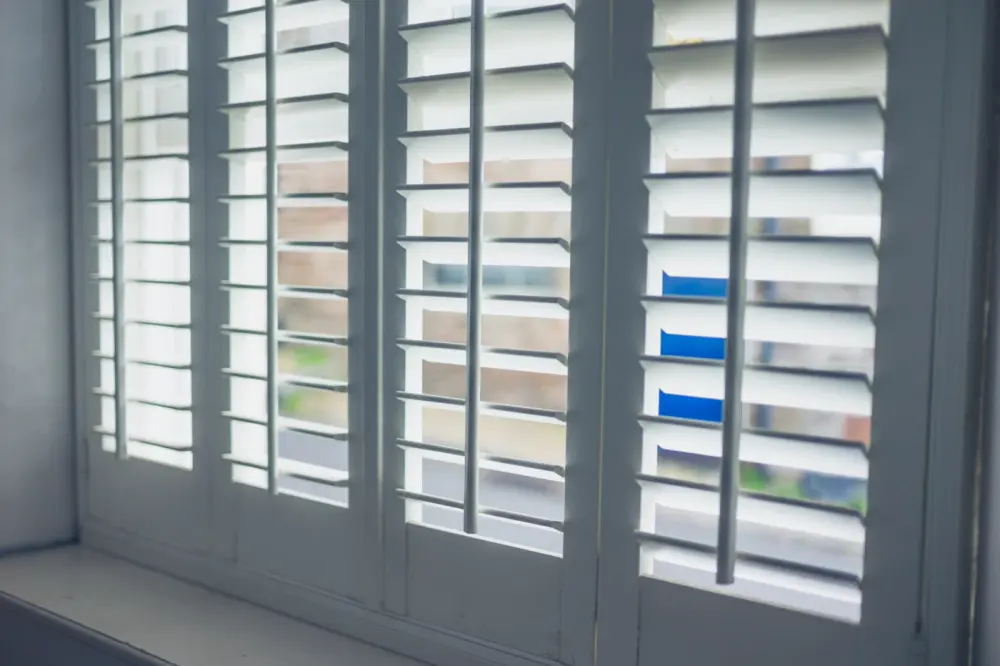 Close-up of wooden shutters with louvres