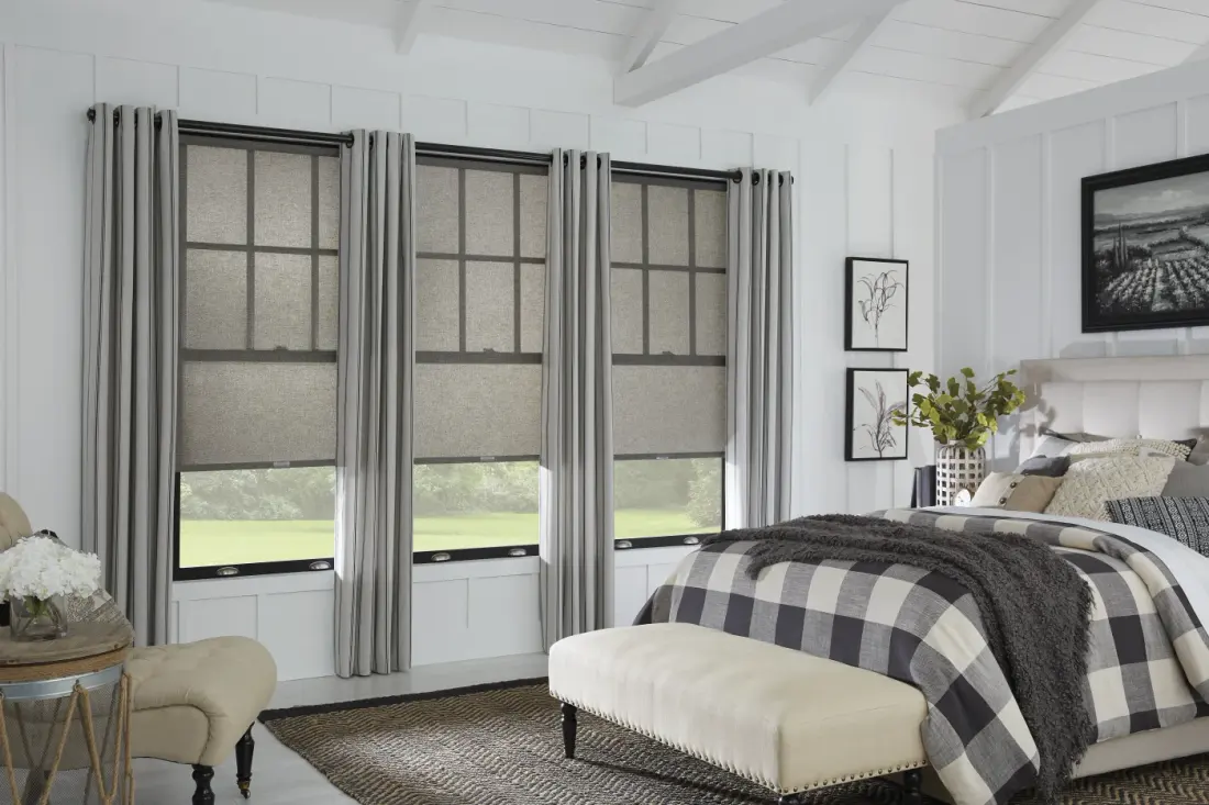Gray roller shades over the windows in a Maricopa County, AZ bedroom.