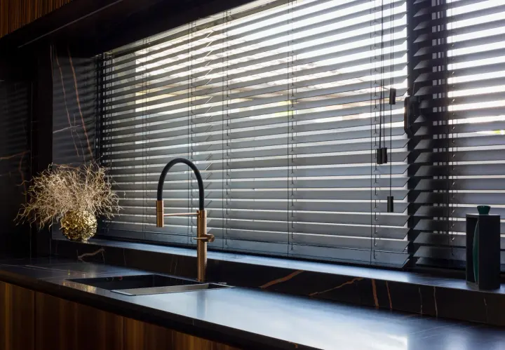 Black blinds on kitchen windows