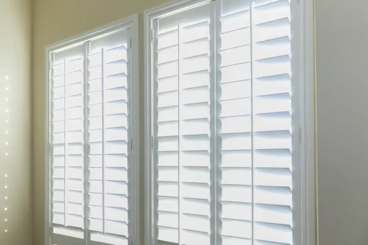 White plantation shutters in a house