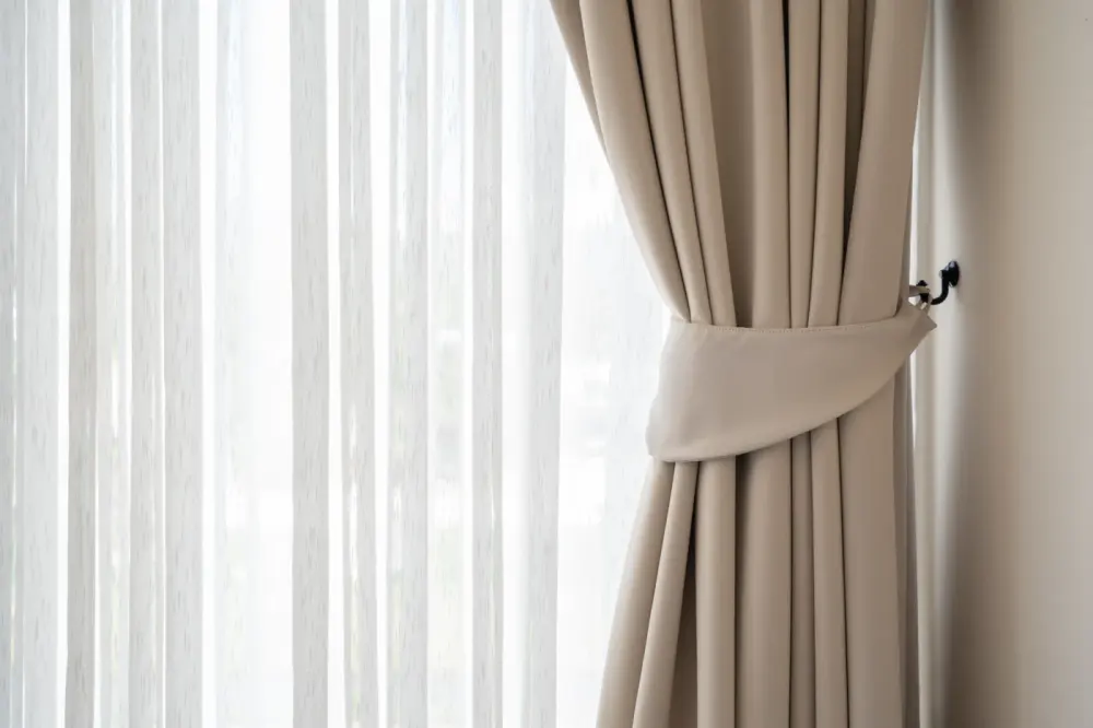 Close-up beige Drapery tied away from window in Queen Creek home