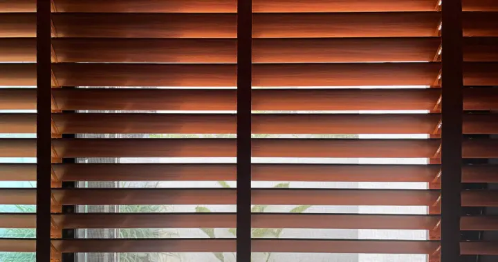 Close view of wooden blinds installed on window