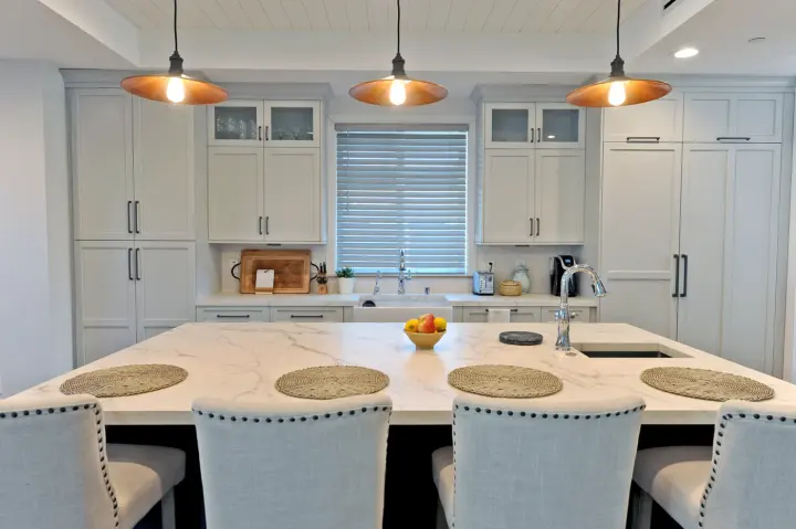 2-inch faux wood SmartPrivacy blinds with wand tilt in a modern gray kitchen