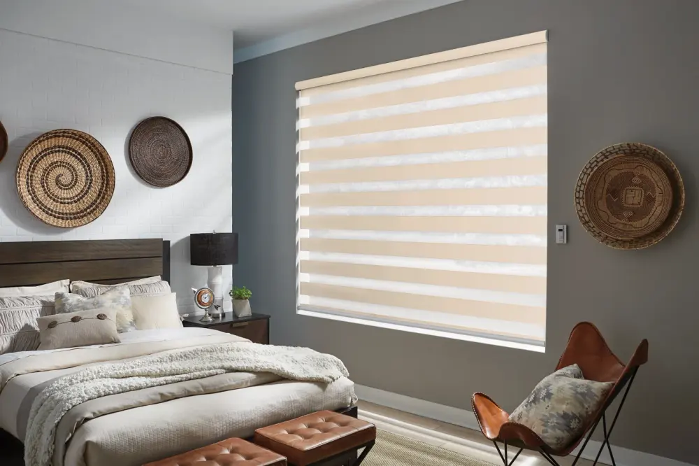 Cream-colored dual shades over a window in a Peoria, AZ bedroom.