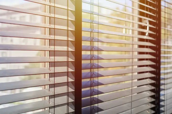 Faux wood blinds over window in Scottsdale, AZ