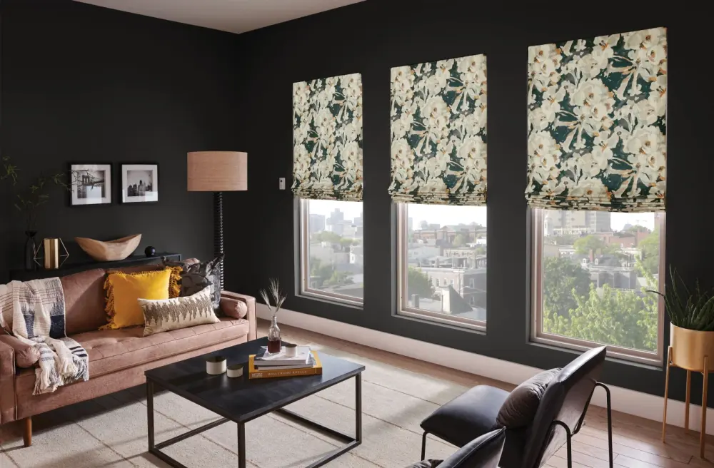 A sitting room with custom-designed window shades.