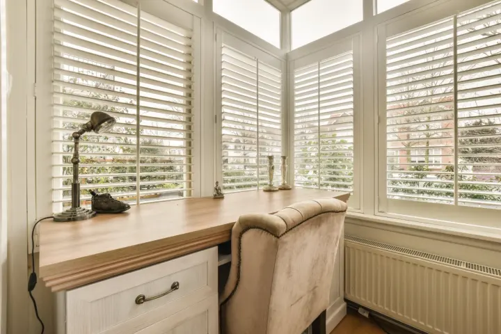 Beautiful shutters in the office of Queen Creek home provided by Southwest Blinds & Shutters