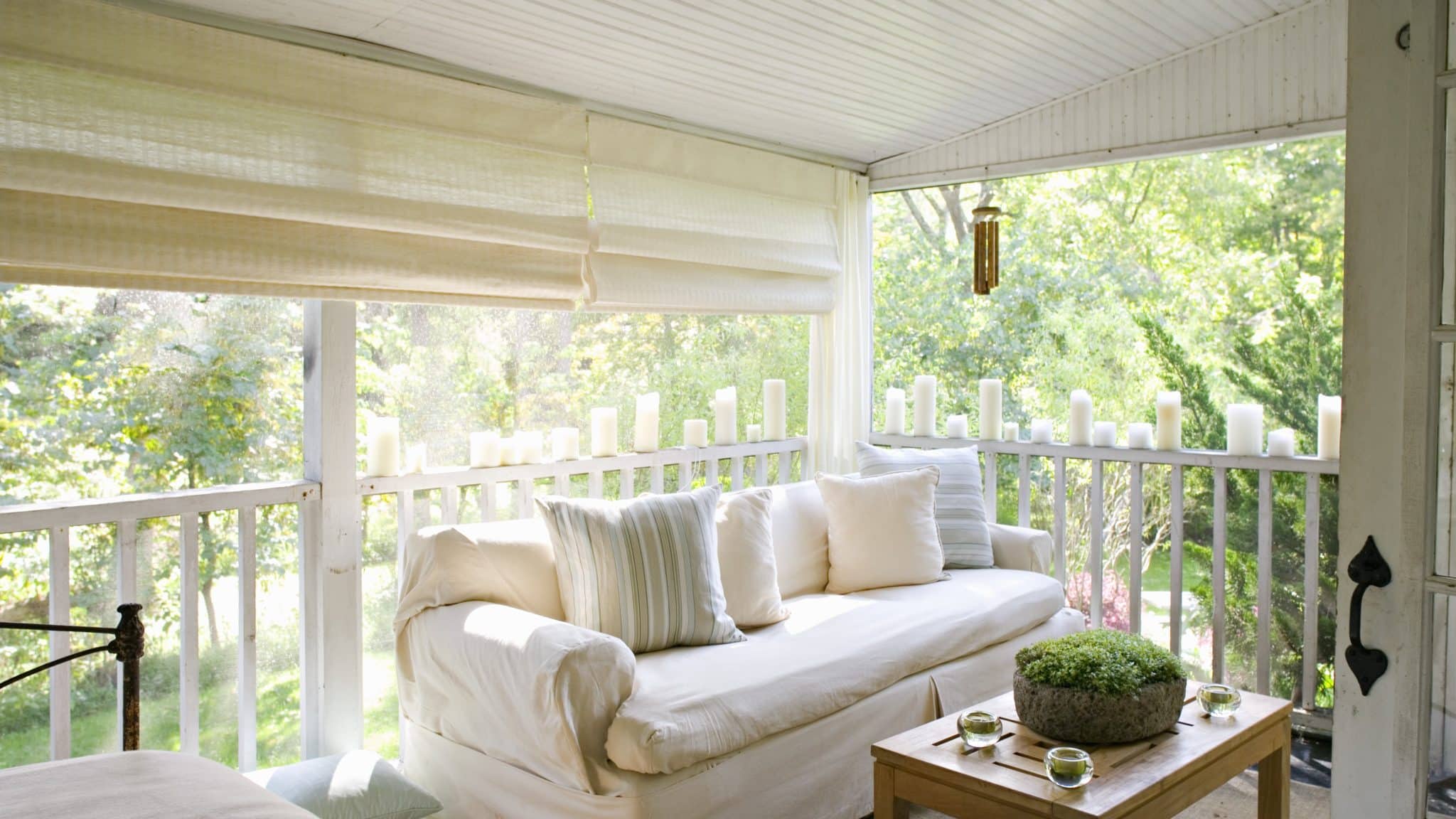 Modern Home Interior With White Motorize Pleated Shades On Large Windows