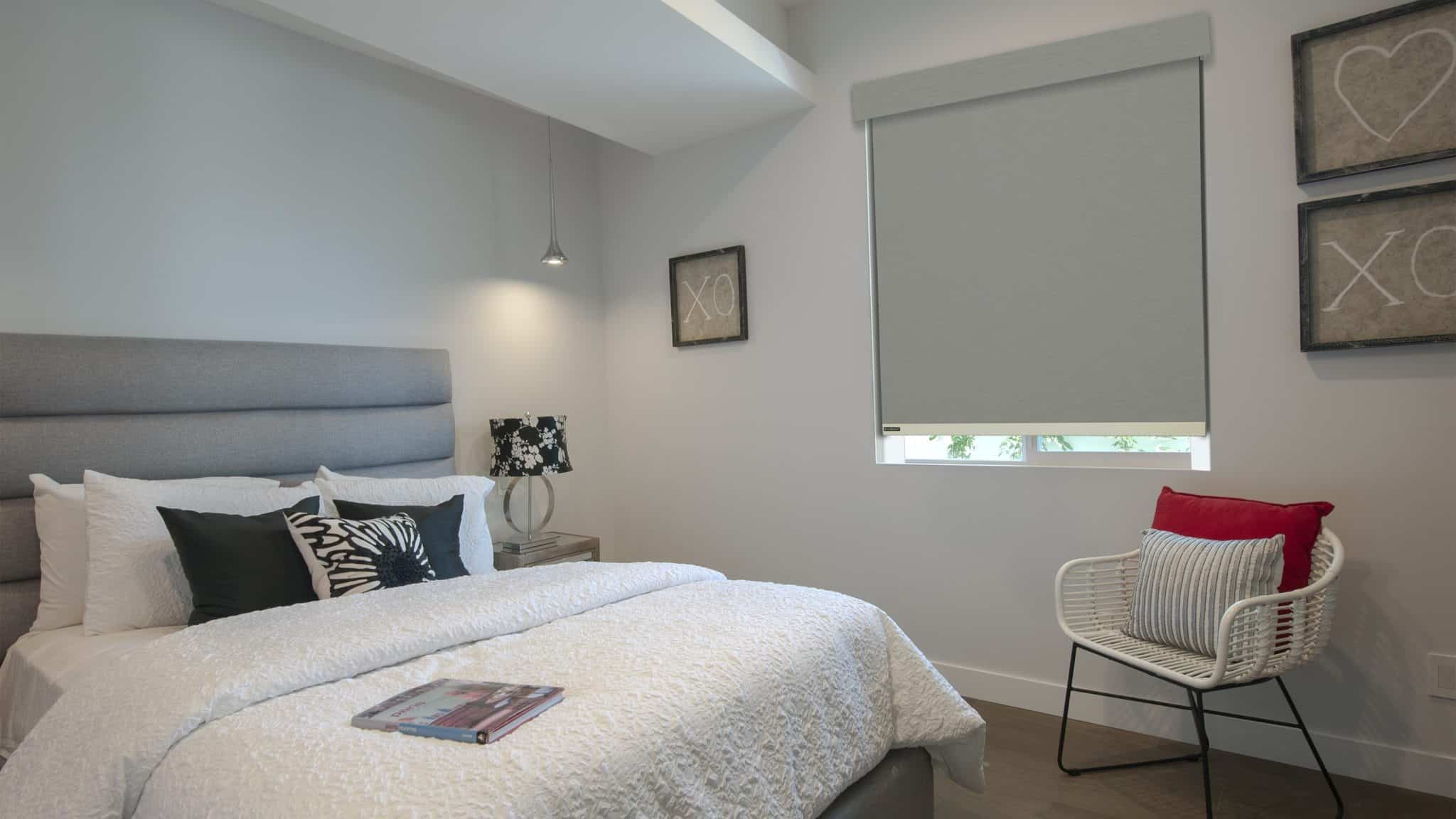 Home Bedroom With A Beautiful Newly Installed Motorized Shutter